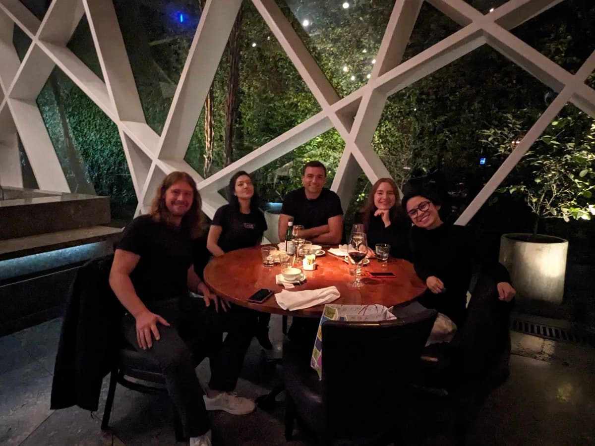 The b00st.com team during a company dinner in Bogotá, Colombia.